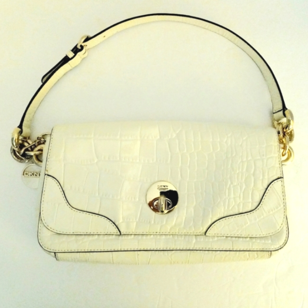 DKNY crocodile look embossed cream color leather handbag with chunky gol…